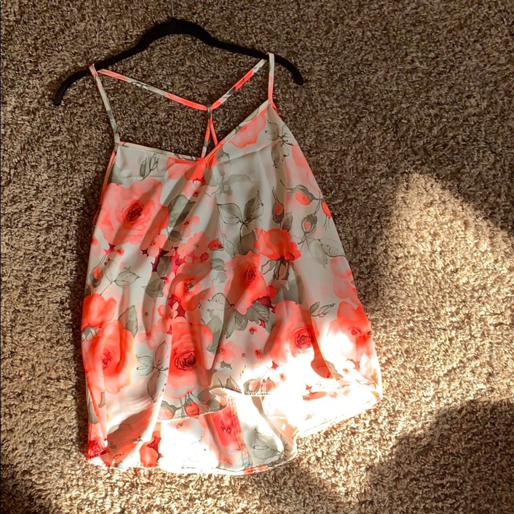 Large floral blouse.